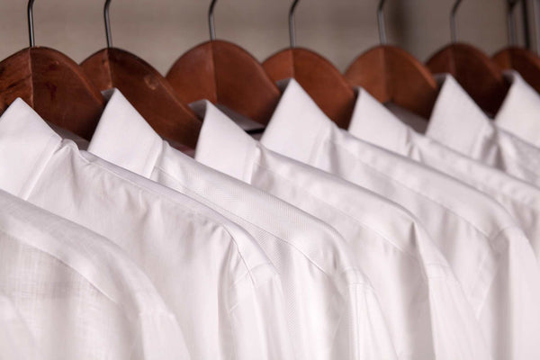 hanged white shirts